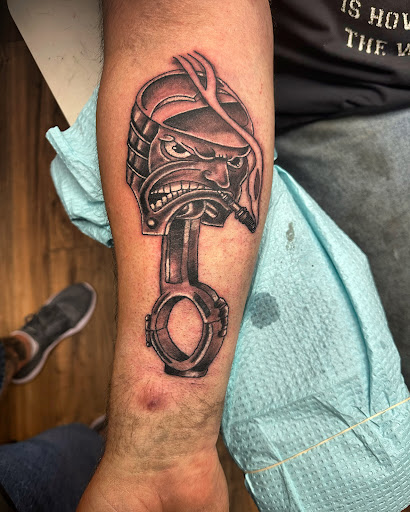 Explore fishnet tattoo ideas, creative tattoo ideas in Hudson Falls, available at ALTERED ADDICTION TATTOOS