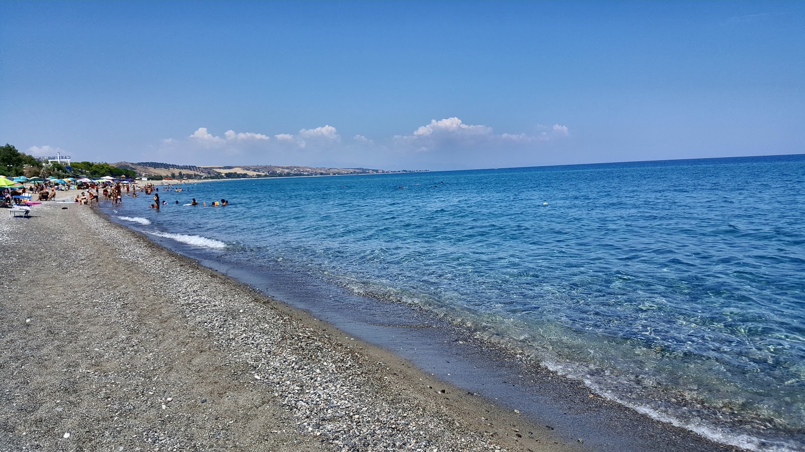 Fotografie cu Antico beach cu o suprafață de nisip gri și pietricel