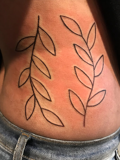 Explore record tattoo ideas, creative tattoo ideas in Clarksville, available at Dark Raine Tattoo