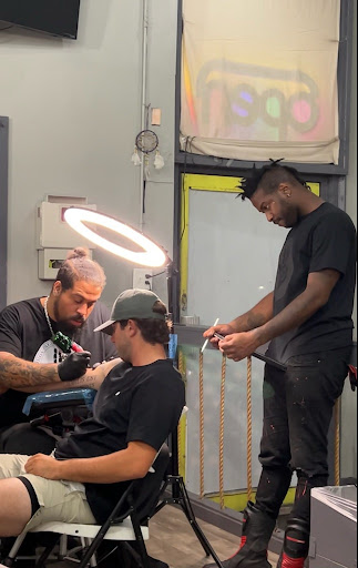 Explore unique tramp stamp tattoo ideas, creative tattoo ideas in Atlanta, available at Iron Palm Tattoos & Body Piercing Atlanta