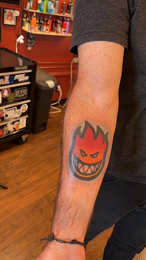 Explore tattoo ideas for men bicep, creative tattoo ideas in Auburn, available at Lighthouse Tattoo Club