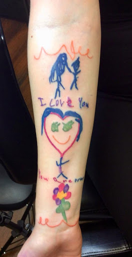 Explore inside bicep tattoo ideas, creative tattoo ideas in Springfield, available at Poke and a Rub art studio