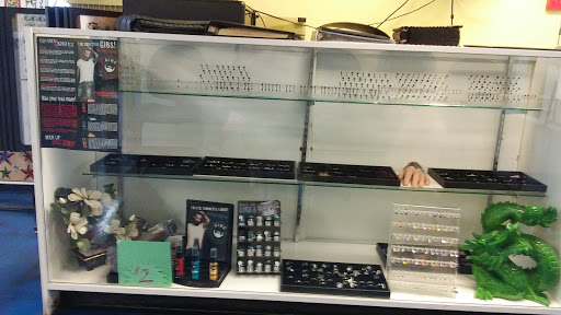 Tattoo Shop «Liquid Tattoo», reviews and photos, 16583 Old U.S. 27, Lansing, MI 48906, USA