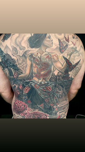 Explore chest tattoo men ideas, creative tattoo ideas in Charlotte, available at Canvas Tattoo & Art Gallery