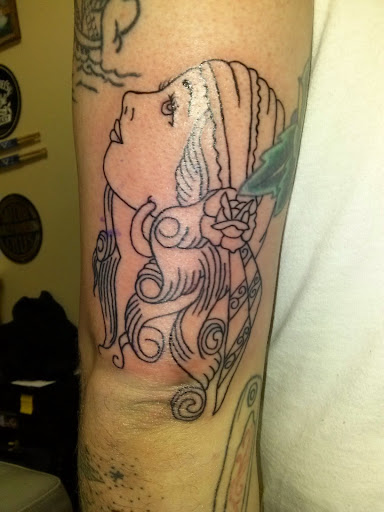 Explore leg flower tattoo ideas, creative tattoo ideas in Lagrangeville, available at Black Cherry Tattoo Studio NY
