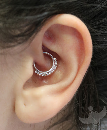 Explore leg flower tattoo ideas, creative tattoo ideas in Syracuse, available at Scarab Body Arts