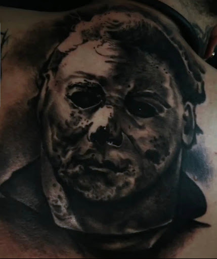 Explore blackout tattoo ideas, creative tattoo ideas in Inkster, available at Legit Ink Tattoo Studios