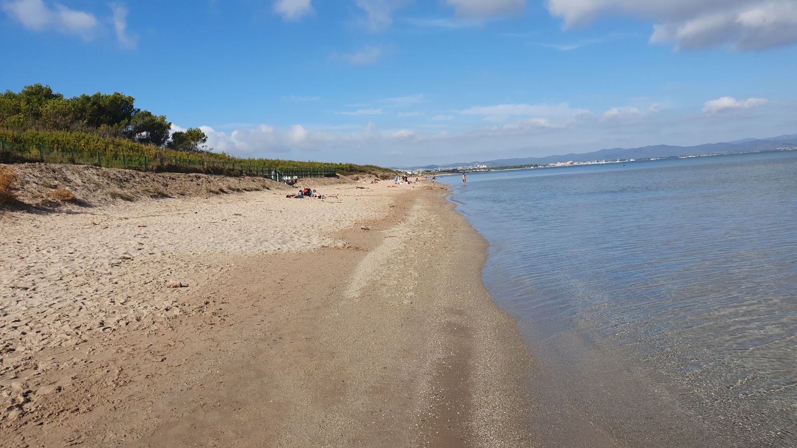 Foto av Badine Stranden med turkos rent vatten yta