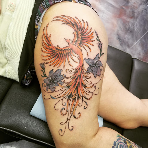 Explore feminine dragon tattoo ideas, creative tattoo ideas in Tucson, available at Jesses Tattoos & Tattoo Supplies