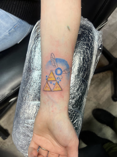 Explore rainbow baby tattoo ideas, creative tattoo ideas in Linn Creek, available at Hillard Skillard Tattoos, LLC.