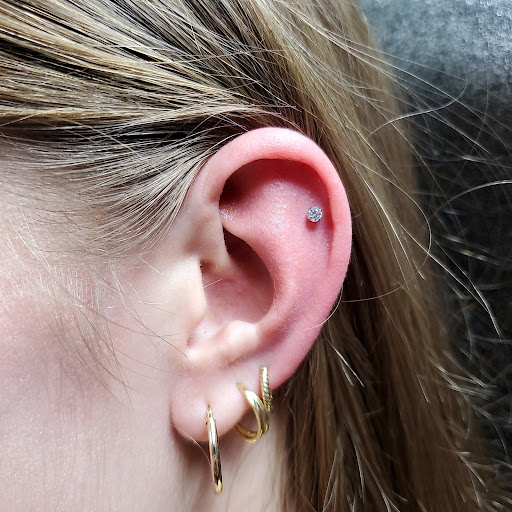 Explore cover up tattoo ideas ankle, creative tattoo ideas in Aurora, available at Skin of A Different Color