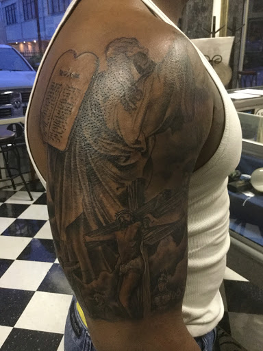 Explore hustle tattoo ideas, creative tattoo ideas in Savannah, available at Tatlyfe Studios