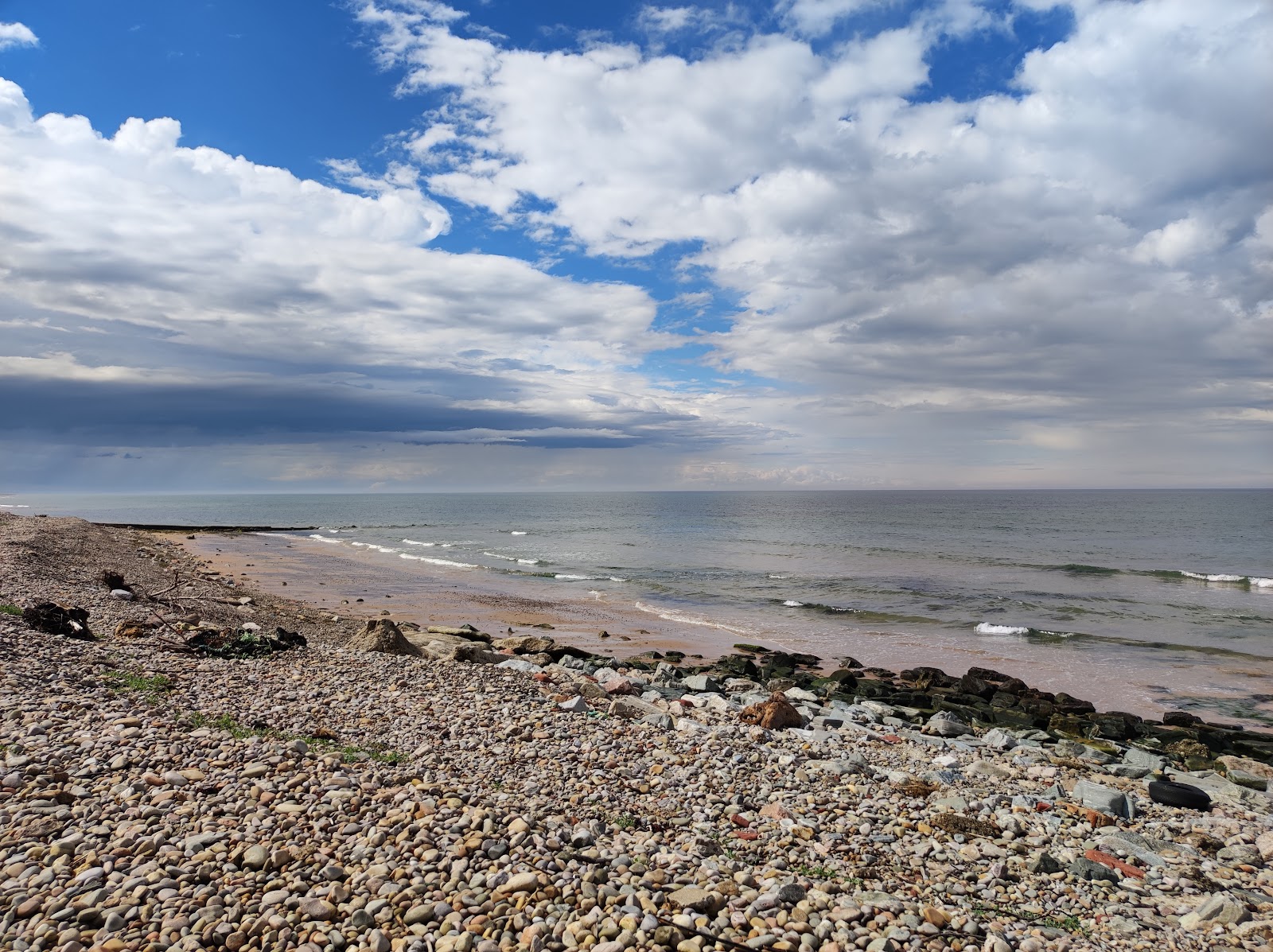 Photo of Portgordon Beach with long straight shore