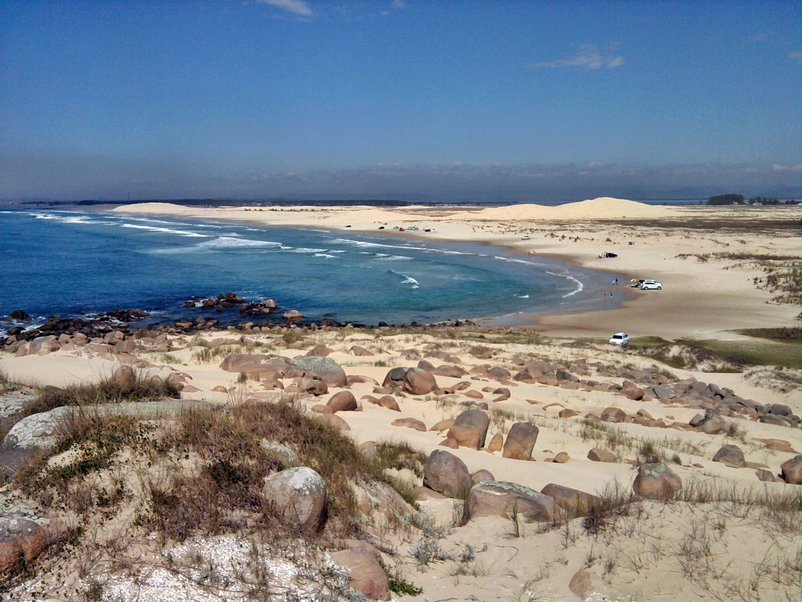 Foto von Praia da Cigana mit feiner beiger sand Oberfläche