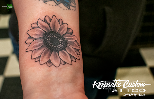 Explore tattoo ideas for wrist cover up, creative tattoo ideas in Salisbury, available at Keepsake Custom Tattoo & Body Piercing Laser Tattoo Removal