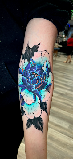 Explore lower back tattoo ideas, creative tattoo ideas in Mesa, available at Next Wave Tattoos and Piercings 2