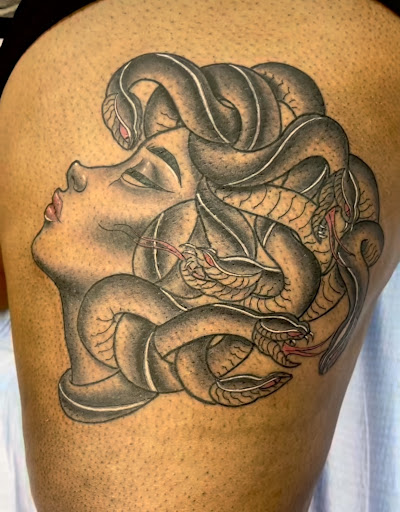 Explore feminine leg tattoo ideas, creative tattoo ideas in Baltimore, available at Rippd Canvas Tattoo Shop Artists Social Club