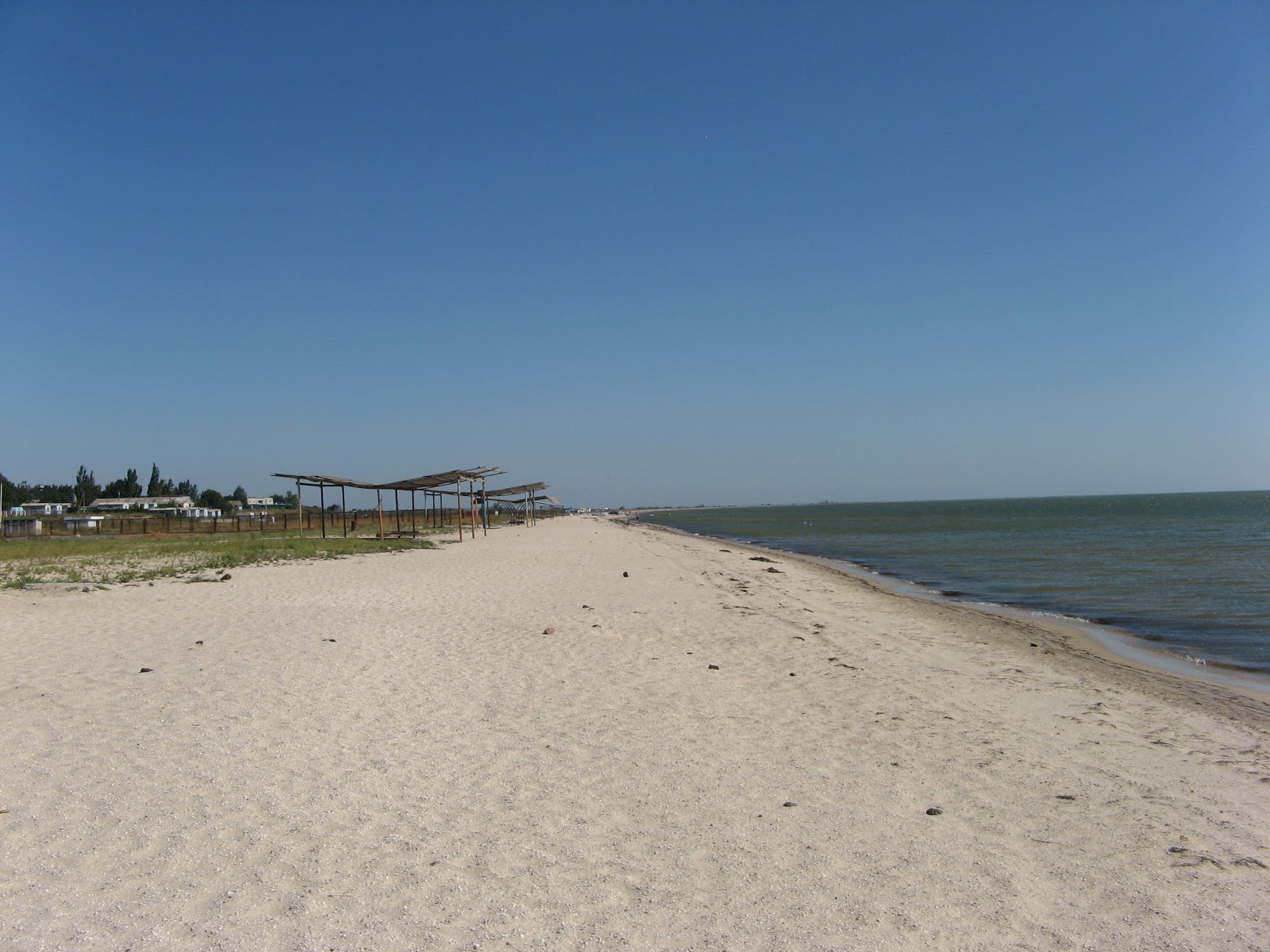 Photo of Plyazh Naberezhnoye with bright shell sand surface