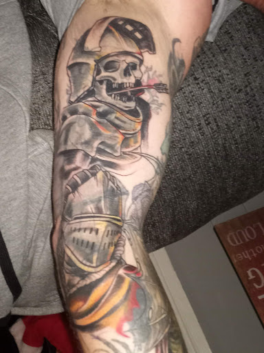 Explore kaws tattoo ideas, creative tattoo ideas in Newark, available at Dark Woods Tattoo Studio