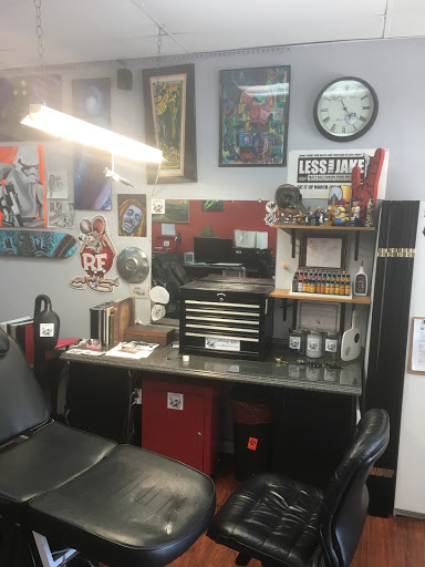 Explore cheetah tattoo ideas, creative tattoo ideas in Largo, available at Alchemy Tattoos and Body Piercings