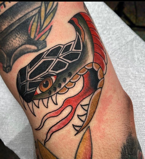 Explore collar tattoo ideas, creative tattoo ideas in Atlanta, available at Big Cat Tattoo