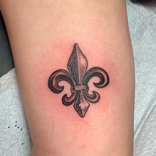 Explore women's cover up tattoo ideas, creative tattoo ideas in New Orleans, available at Downtown Tattoos and Piercing