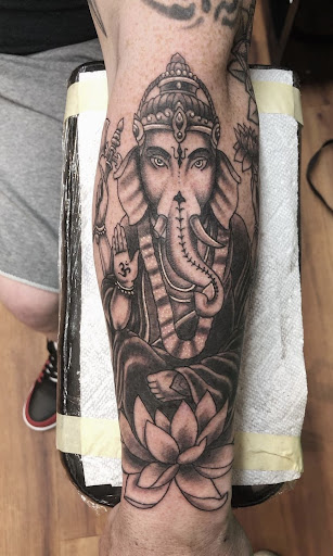 Explore curious george tattoo ideas, creative tattoo ideas in Rutherford, available at Arcana Tattoo