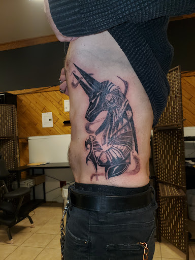 Explore peacock feather tattoo ideas, creative tattoo ideas in Rhinelander, available at Filling The VOID Tattoo Studio