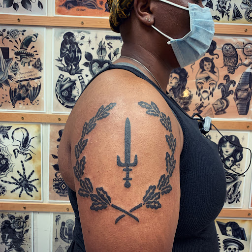 Explore gym tattoo ideas small, creative tattoo ideas in Milwaukee, available at MANIA Tattoos Milwaukee