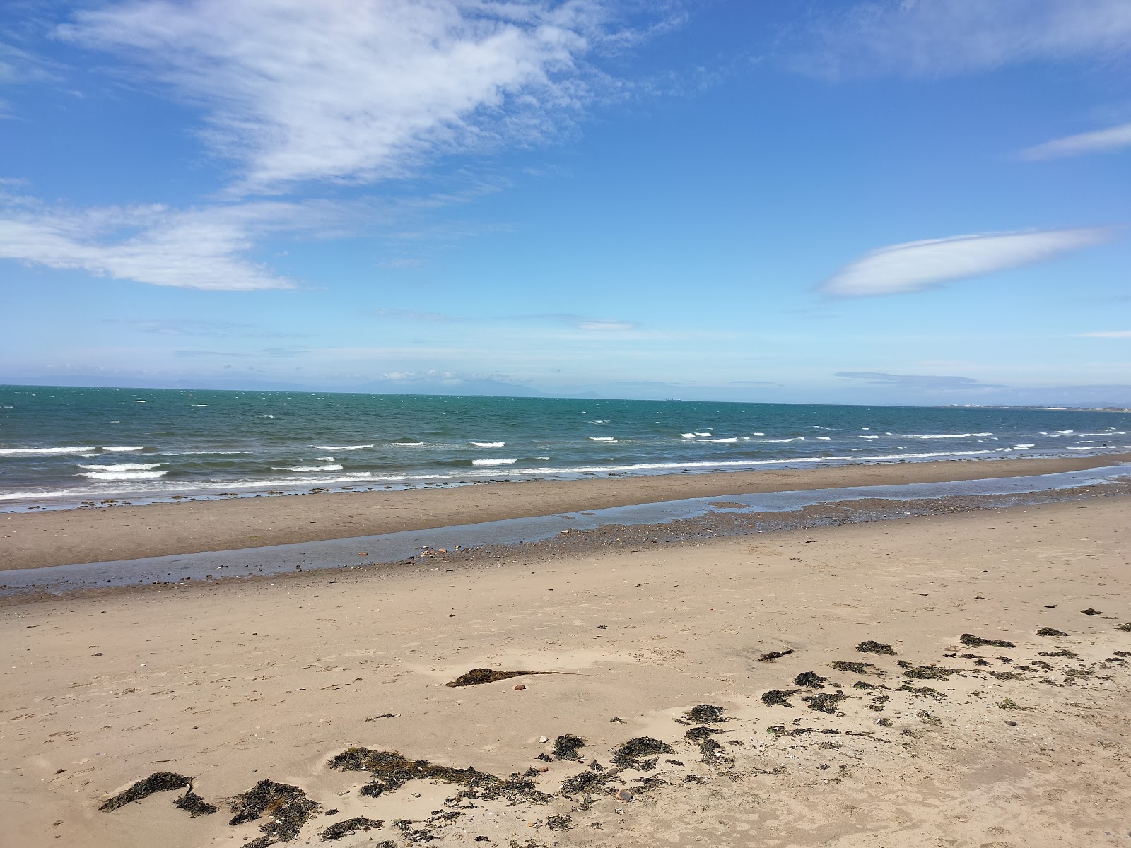 普雷斯特威克海滩的照片 带有碧绿色水表面