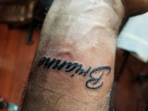 Explore tattoo cover up ideas on forearm, creative tattoo ideas in Bethlehem, available at Obsidian Tattoo and Piercing Parlor