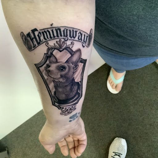 Explore pineapple tattoo ideas, creative tattoo ideas in Waterville, available at MADD INK Tattoo & Piercing Studio