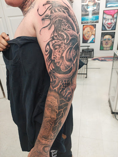 Explore alchemist tattoo ideas, creative tattoo ideas in Fort Mohave, available at RedRum Tattoo & Body Piercing Co.