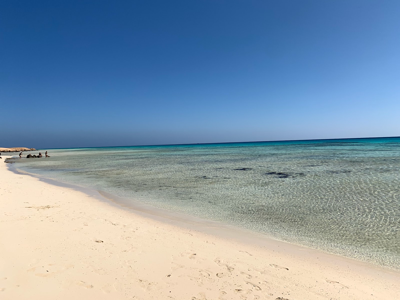 Foto di Sharm El Luli con una superficie del sabbia luminosa