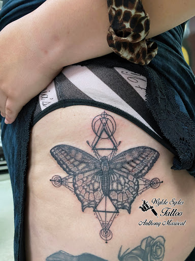 Explore tattoo ideas on lower stomach, creative tattoo ideas in San Diego, available at Wylde Sydes Tattoo & Body Piercing