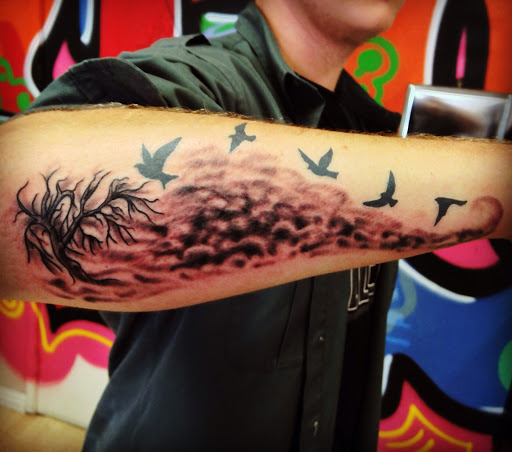 Explore smile tattoo ideas, creative tattoo ideas in Sacramento, available at 13 MAG TATTOO