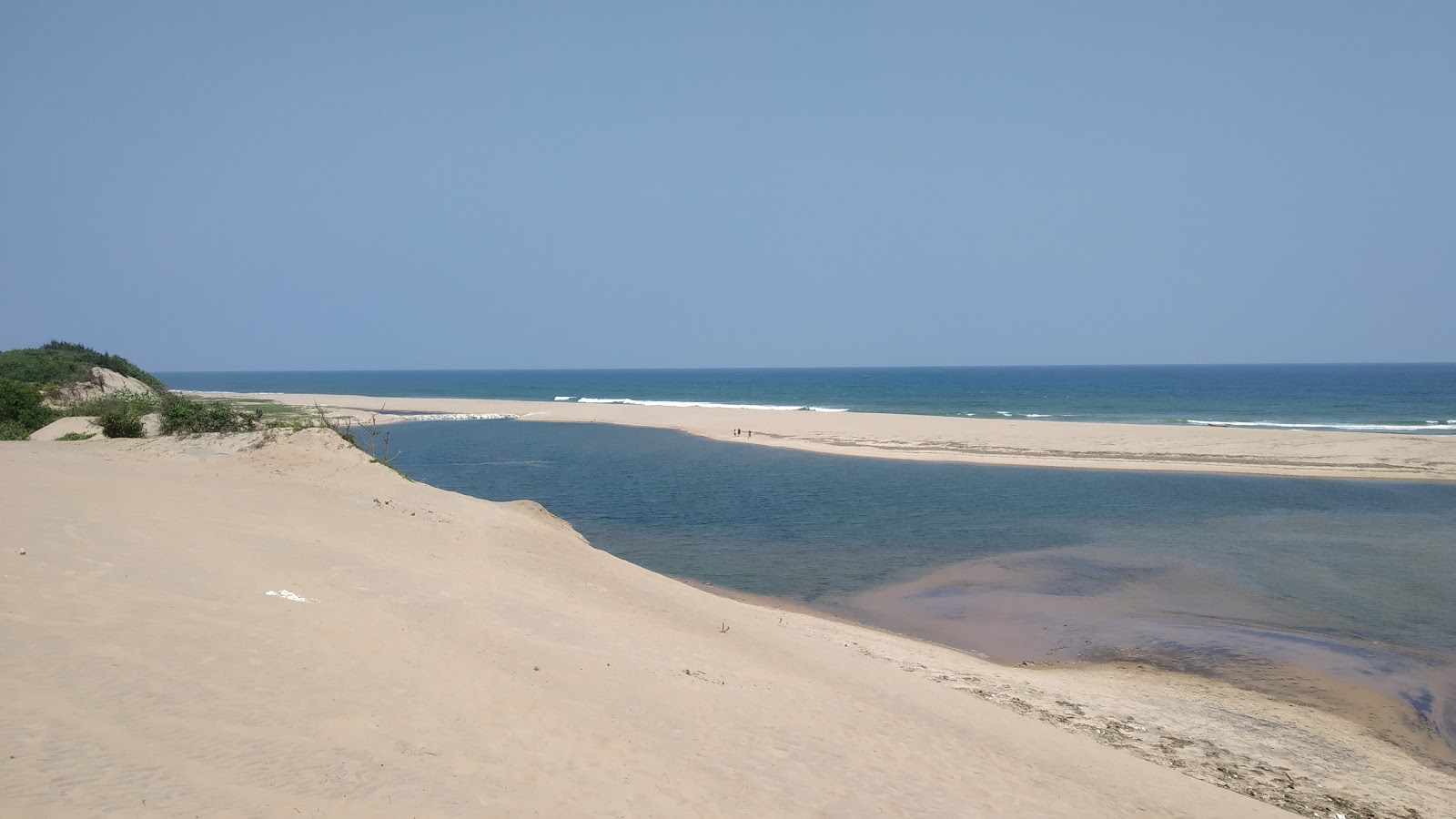Foto de Markandi Beach con recta y larga