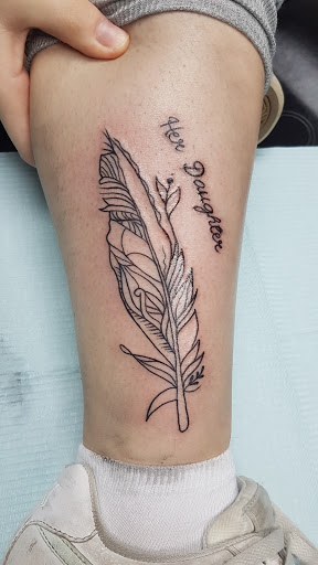 Explore tattoo flag ideas, creative tattoo ideas in Wichita Falls, available at Underground Tattoo & Body Piercing