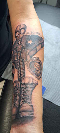 Explore parkinson's tattoo ideas, creative tattoo ideas in Fort Gratiot, available at Stained Glass Tattoo & Body Piercing