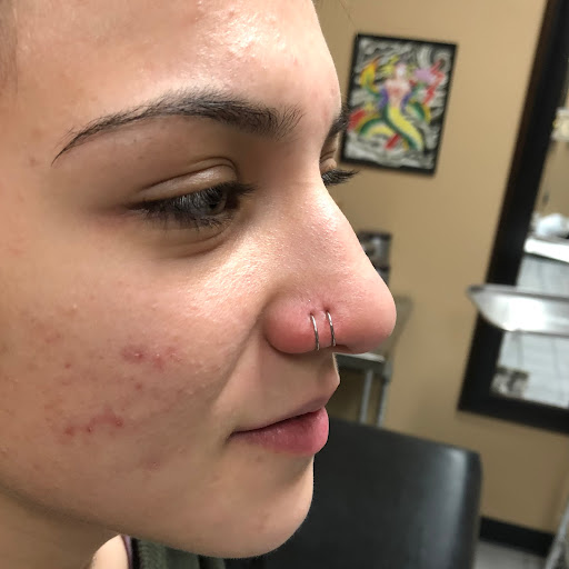 Explore behind ear tattoo ideas, creative tattoo ideas in Germantown, available at Ambrotos Tattoo