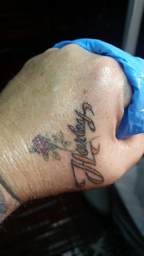 Explore infinity tattoo cover up ideas, creative tattoo ideas in Davis, available at SIX GUN SOUND TATTOO