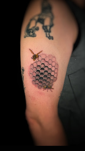 Explore mad max tattoo ideas, creative tattoo ideas in Washington, available at Trilogy Atelier - DC Tattoo Shop Piercing Studio