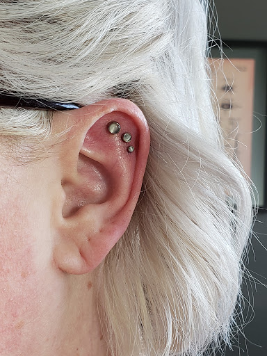 Explore bonnie and clyde tattoo ideas, creative tattoo ideas in Reno, available at Black Hole Body Piercing