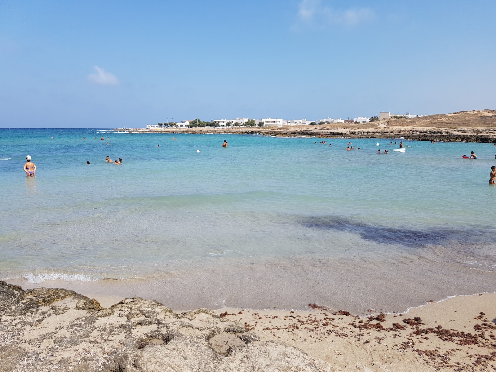 Foto de Spiaggia Mezzaluna con parcialmente limpio nivel de limpieza