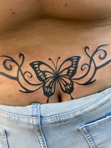 Explore women's hand tattoo ideas, creative tattoo ideas in Charlotte, available at BNI-Tattoos