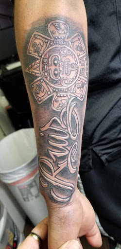 Explore tattoo ideas for a name cover up, creative tattoo ideas in Wenatchee, available at Rebels Tattoo Studio