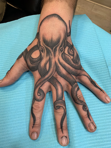 Explore jurassic park tattoo ideas, creative tattoo ideas in Brunswick, available at Blue Fin Tattoos