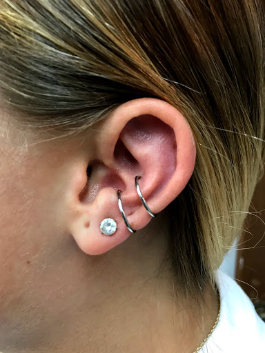 Explore cool cross tattoo ideas, creative tattoo ideas in Myrtle Beach, available at Elite Body Piercing