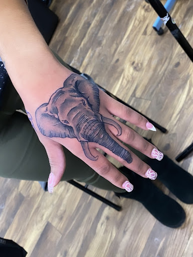 Explore tattoo ideas woman shoulder, creative tattoo ideas in Baltimore, available at Rippd Canvas Tattoo Shop Artists Social Club