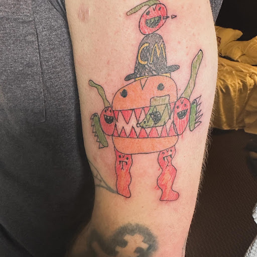 Explore portrait sleeve tattoo ideas, creative tattoo ideas in Redding, available at The Salty Sloth Tattoo